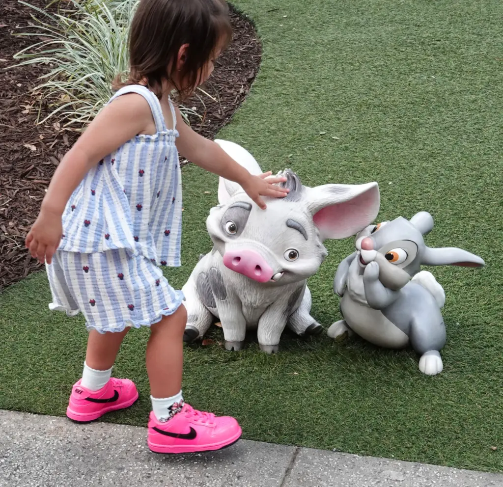 Toddler-sized characters in the courtyard during a preview of The...