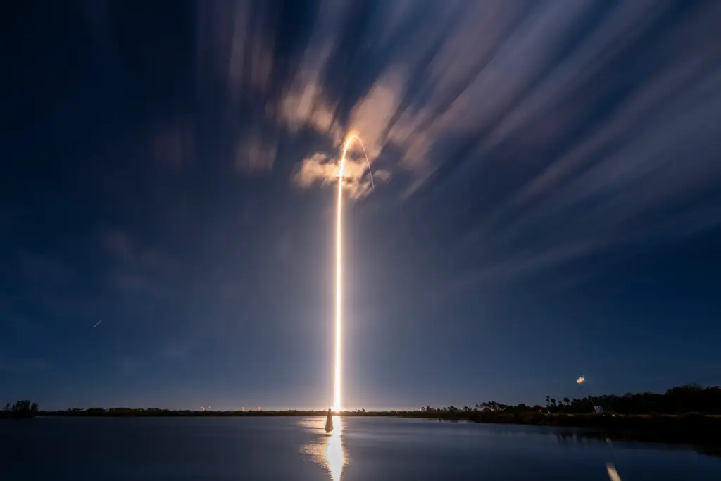 A SpaceX Falcon 9 carrying 29 Starlink satellites launches from...