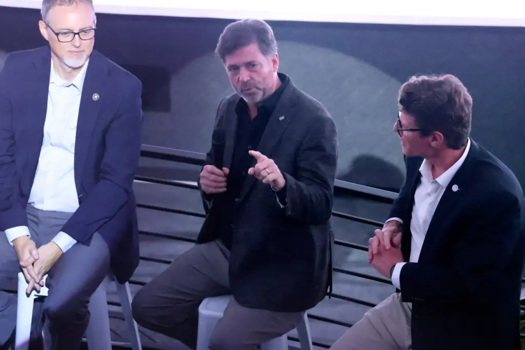 Panel members, from left: James W. Draper, Philip Metzger, and...