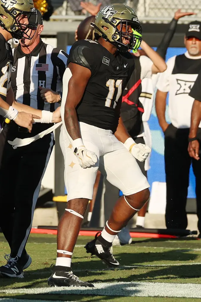 UCF running back Landen Chambers (11) celebrates after a touchdown...