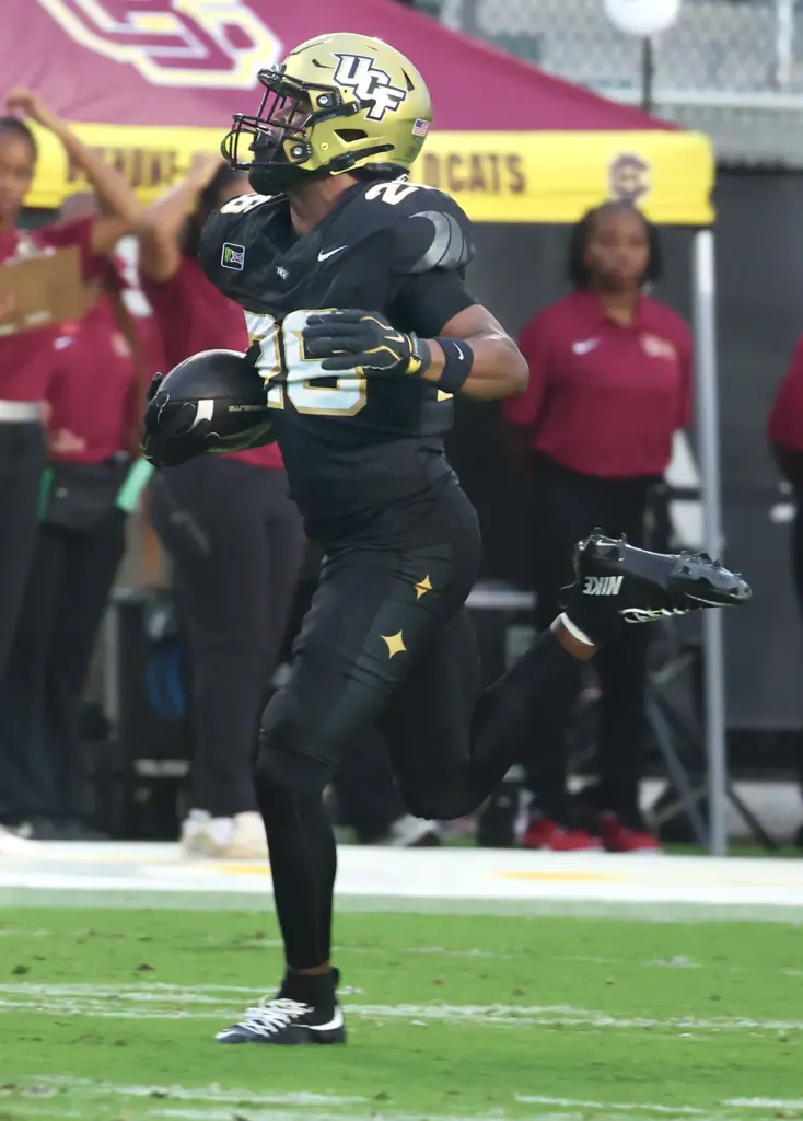 UCF running back Duke Watson runs for a touchdown during...