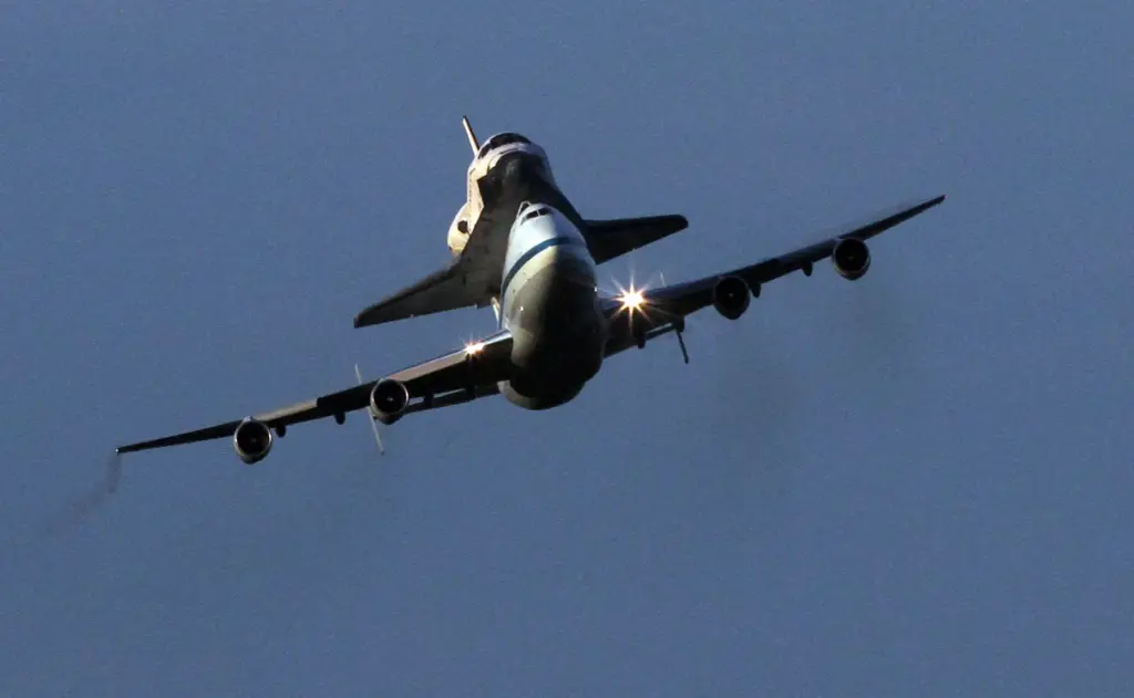 A modified 747 jumbo jet carrying Space Shuttle Endeavour piggyback...