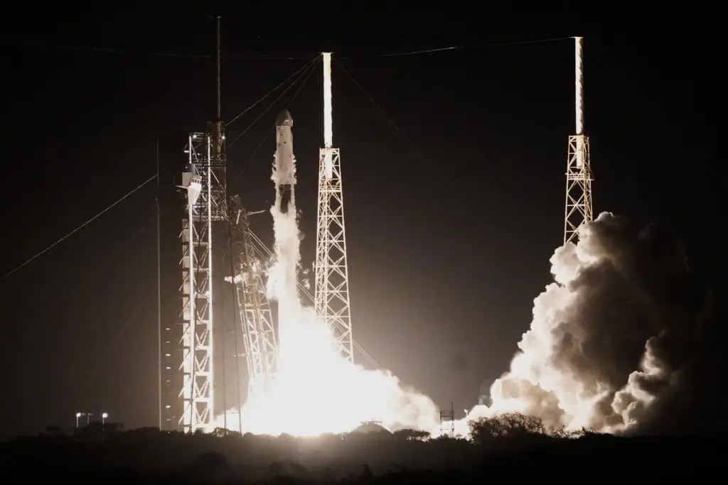 A SpaceX Falcon 9 rocket with a crew of four...
