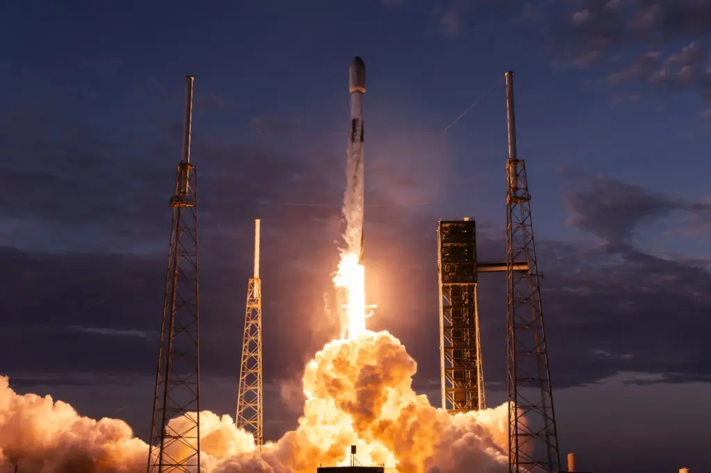 A SpaceX Falcon 9 on a Starlink mission launches at...