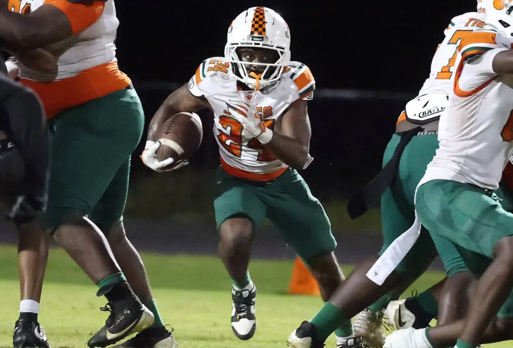 Jones High's Bennie Johnson (24) runs against Ocoee in an...