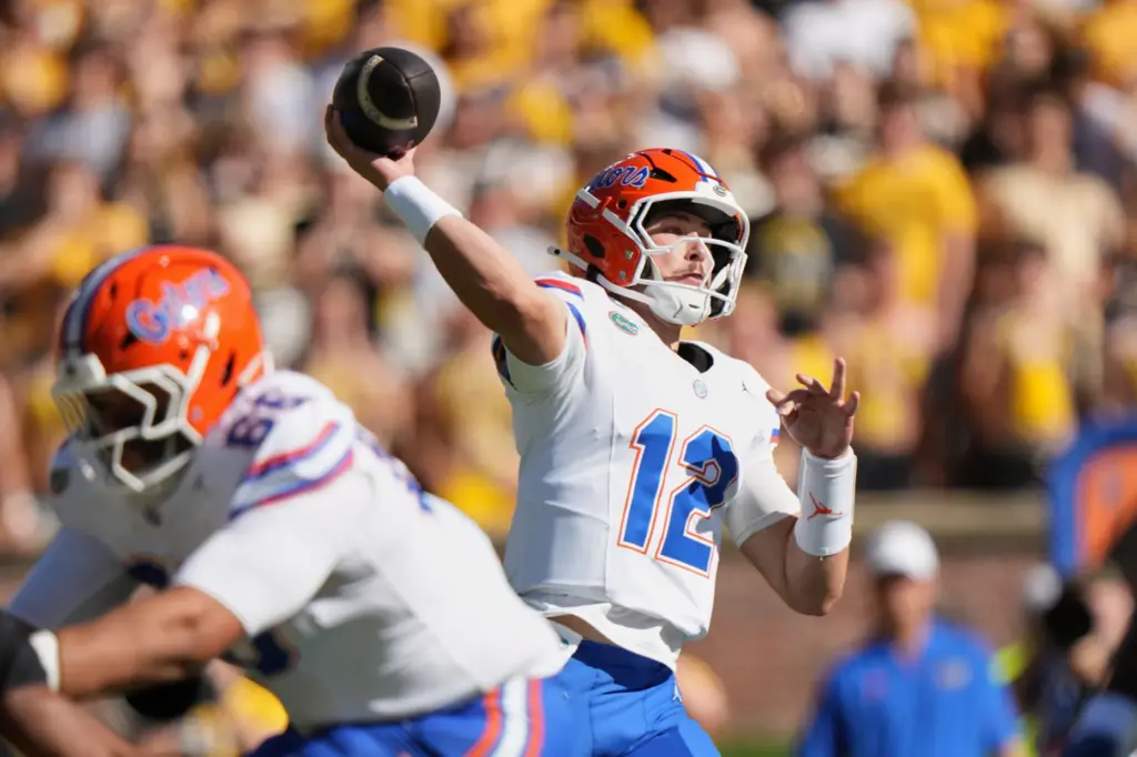 Florida quarterback Aaron Philo throws during the first half of...