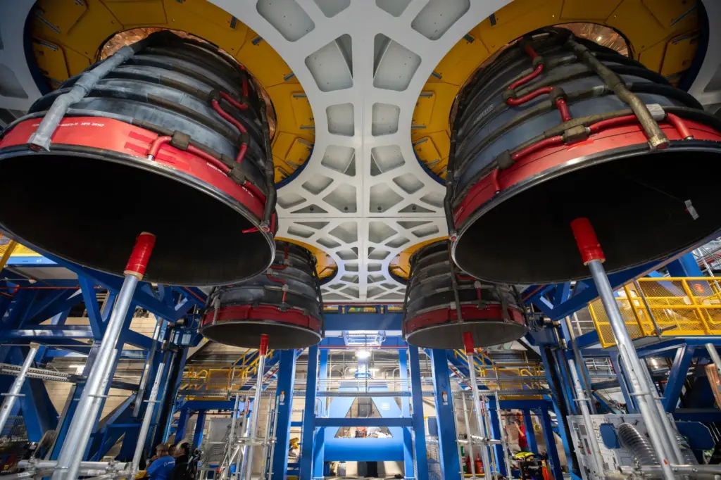 TechniciansÂ complete installation of all four RS-25 SLS (Space Launch System)...