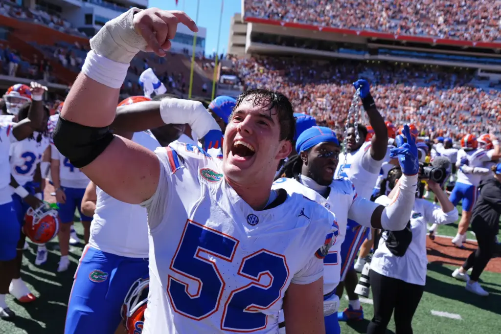 Florida players celebrate their win over Texas in an NCAA...