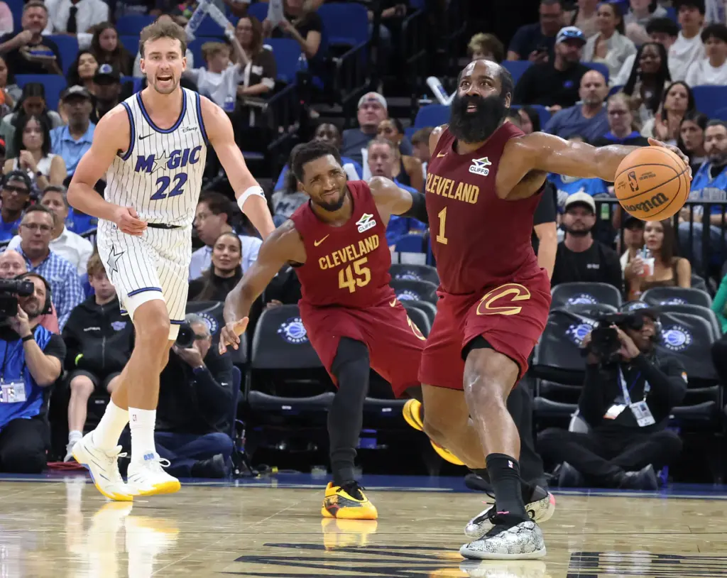 Cleveland guard James Harden (1) passes in front of Orlando...