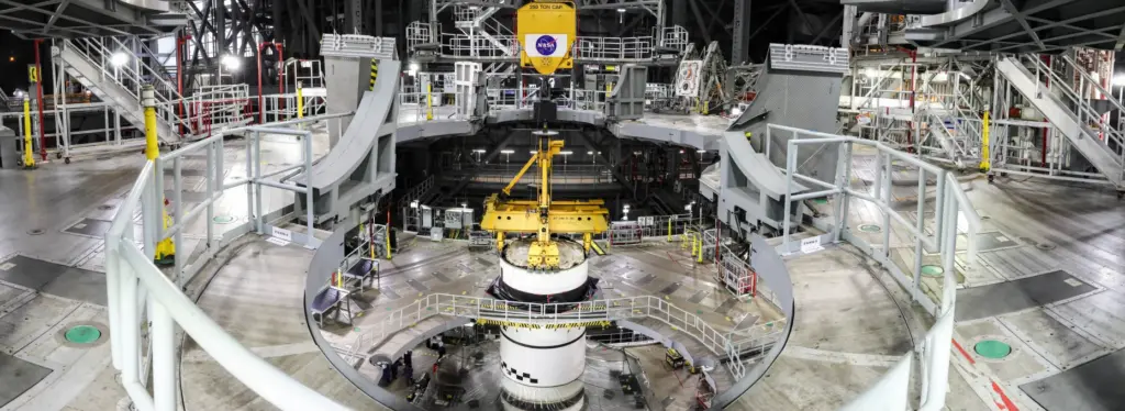 Technicians inside the Vehicle Assembly Building at NASA's Kennedy Space...
