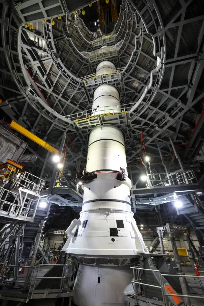 Technicians inside the Vehicle Assembly Building at NASA's Kennedy Space...