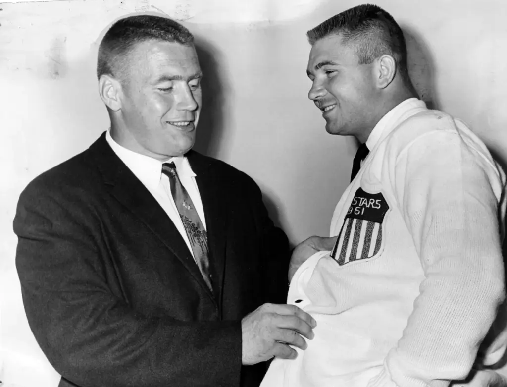 Bears guard Stan Jones, left, named professional player of the...
