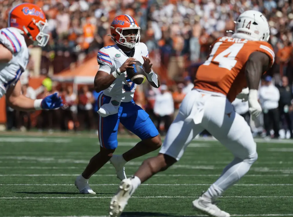 Florida quarterback Tramell Jones Jr. (9) looks to pass against...