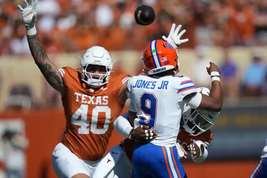 Florida quarterback Tramell Jones Jr. (9) is hit by Texas...
