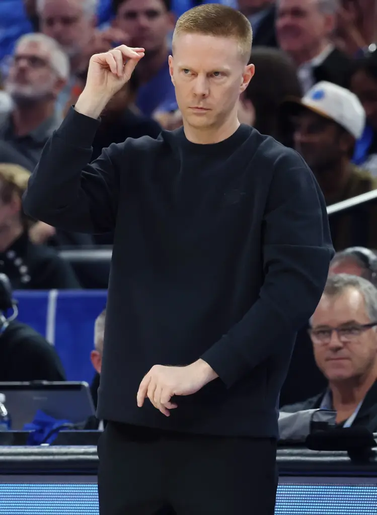 Orlando coach Sean Sweeney signals during the Atlanta Hawks at...