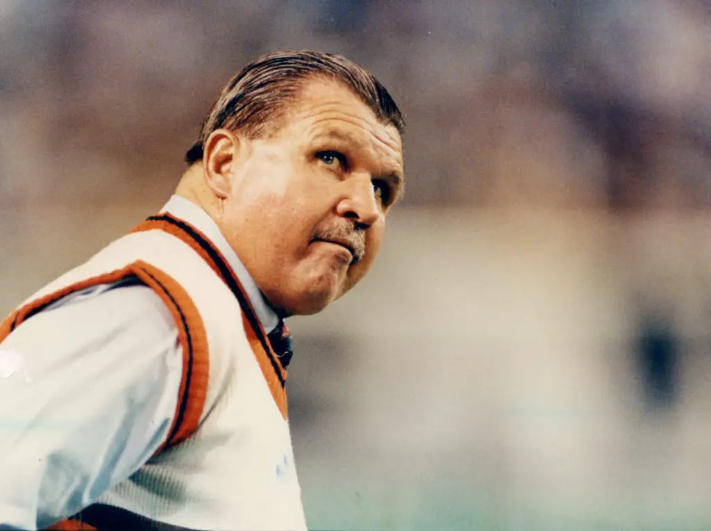Mike Ditka looks at the clock during the 2nd quarter...
