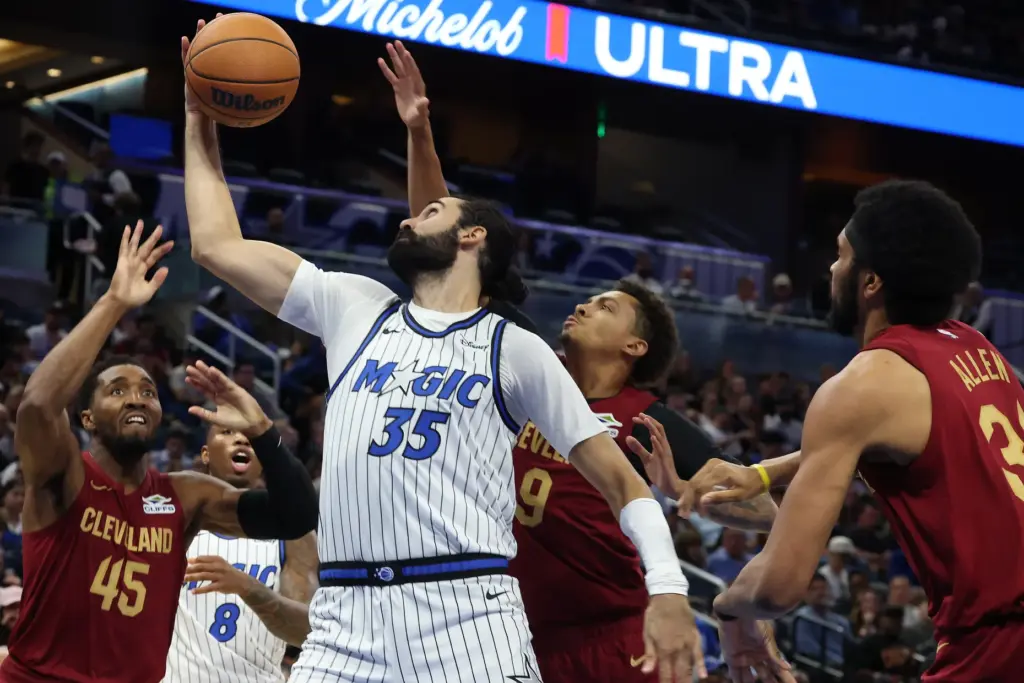 Orlando center Goga Bitadze (35) grabs a rebound during the...