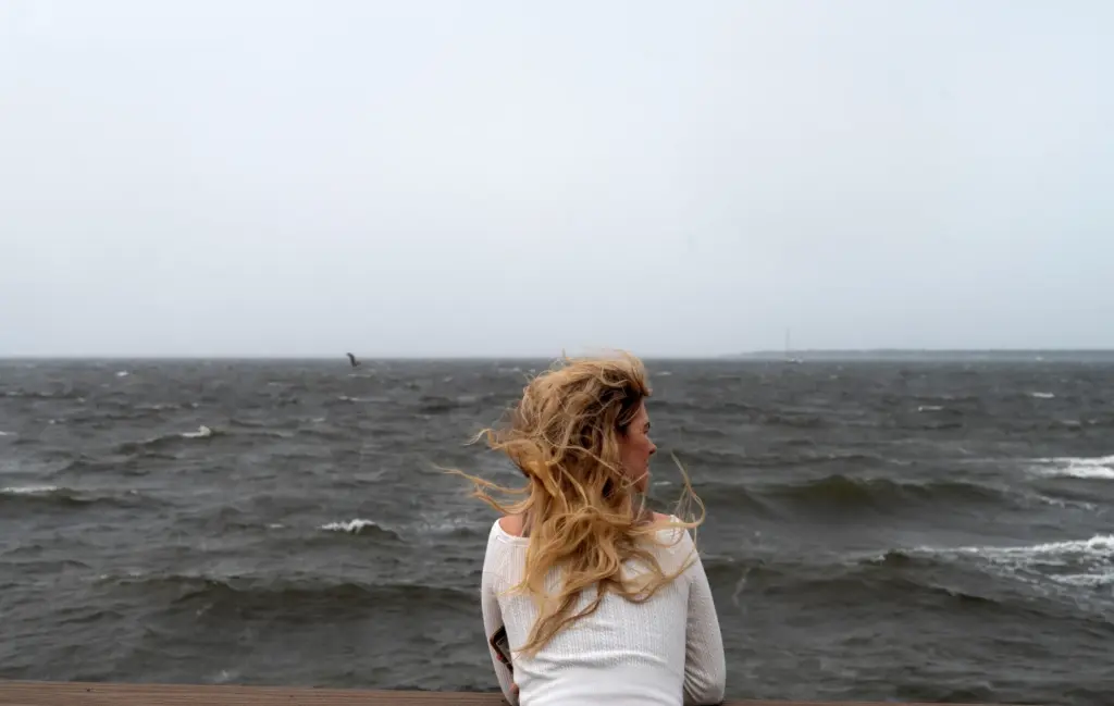 Waves arrive ahead of Hurricane Isaias in Gulf Breeze, Fla.,...