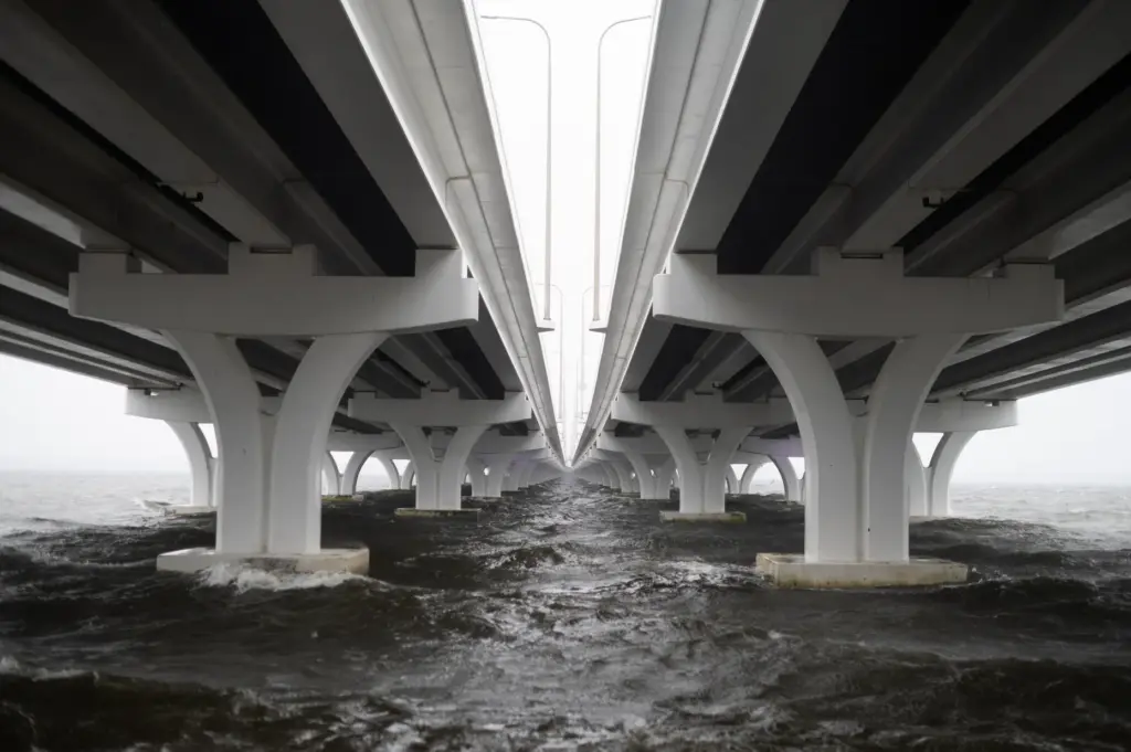 Waves hit the bridge connecting Gulf Breeze to Pensacola, Fla....