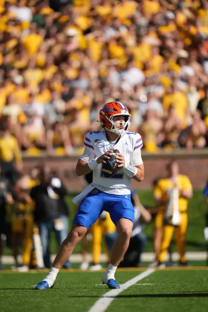 Florida quarterback Aaron Philo drops back to pass during the...