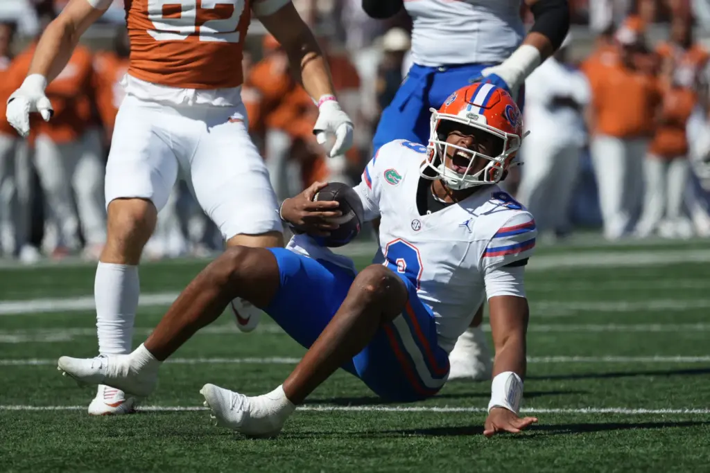 Florida quarterback Tramell Jones Jr. (9) reacts after running for...