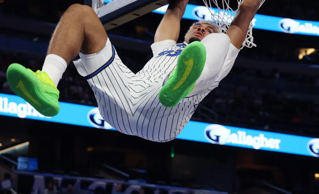 Orlando forward Noah Penda finishes a slam dunk during the...