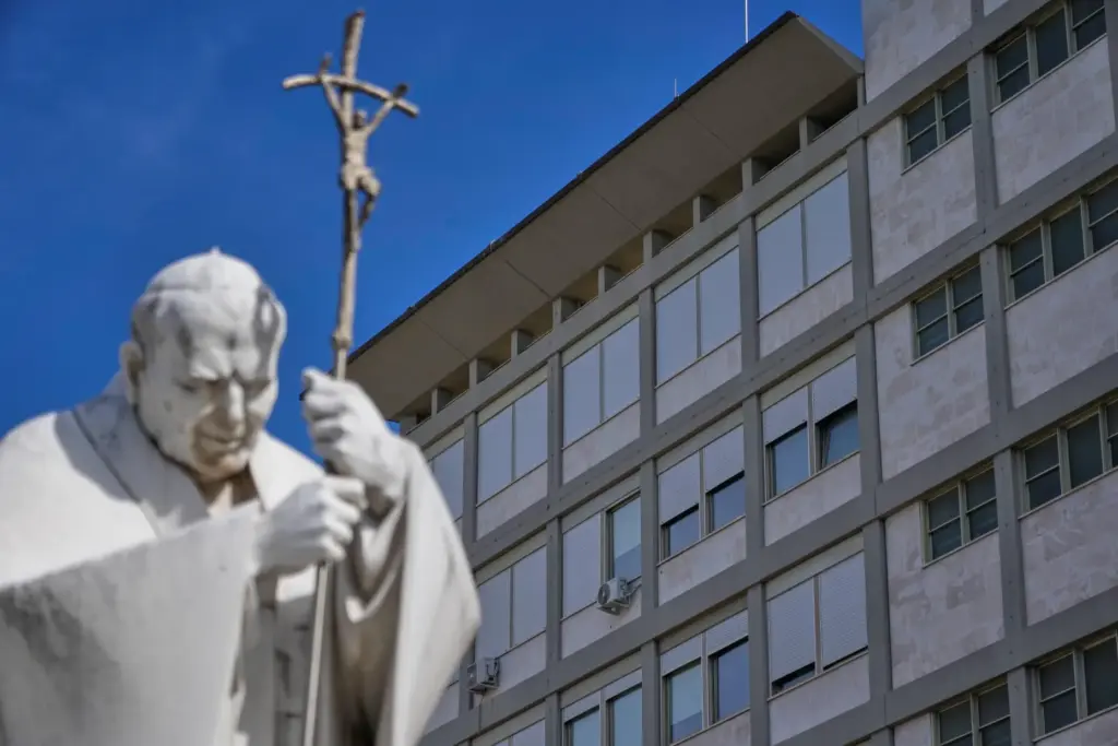 The statue of late Pope John Paul II is pictured at the Agostino Gemelli Polyclinic.
