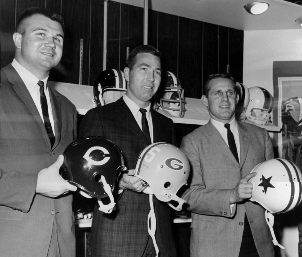 Mike Ditka of the Chicago Bears, left, with Bart Starr...