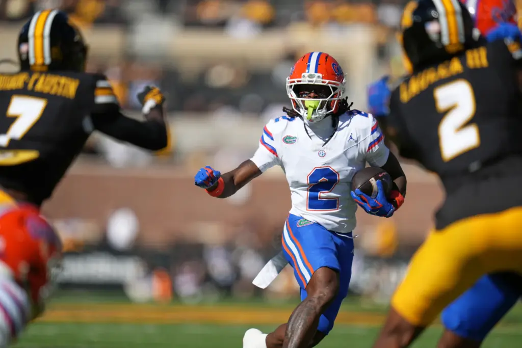 Florida wide receiver Eric Singleton Jr. (2) runs with the...