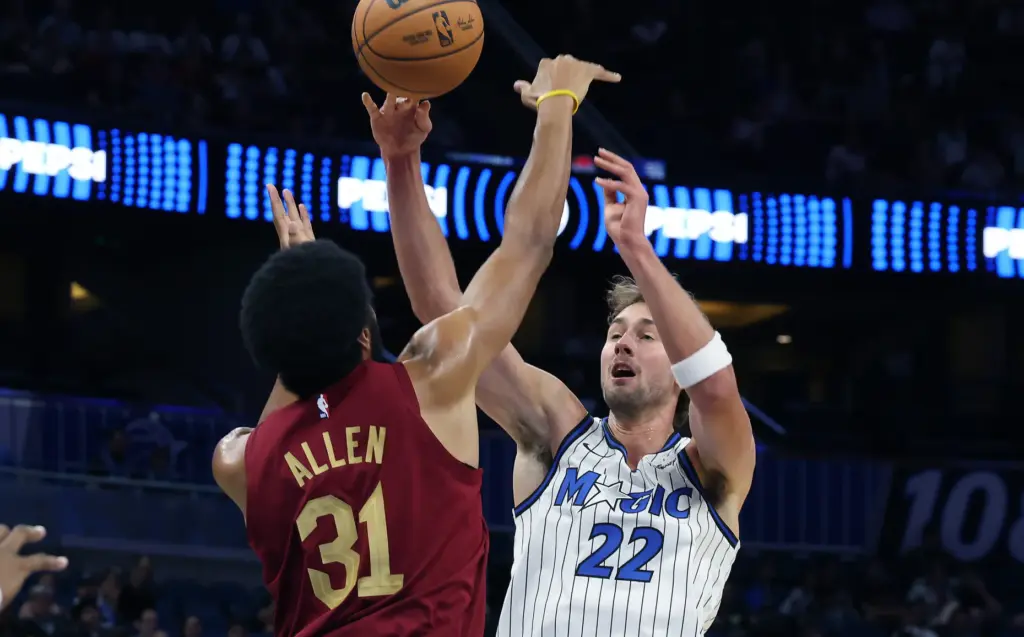 Cleveland center Jarrett Allen (31) tips a shot by Orlando...