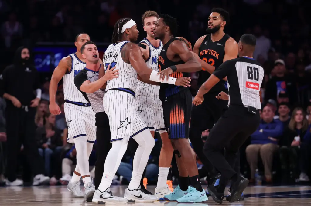 NEW YORK, NEW YORK - OCTOBER 25: OG Anunoby #8 of the New York Knicks confronts Wendell Carter Jr. #34 of the Orlando Magic after committing a flagrant foul during the first quarter of the game at Madison Square Garden on October 25, 2026 in New York City. NOTE TO USER: User expressly acknowledges and agrees that, by downloading and or using this photograph, User is consenting to the terms and conditions of the Getty Images License Agreement. (Photo by Dustin Satloff/Getty Images)