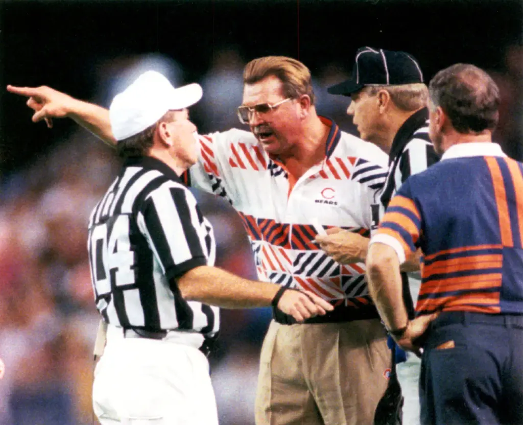 Bears coach Mike Ditka argues a face mask call in...