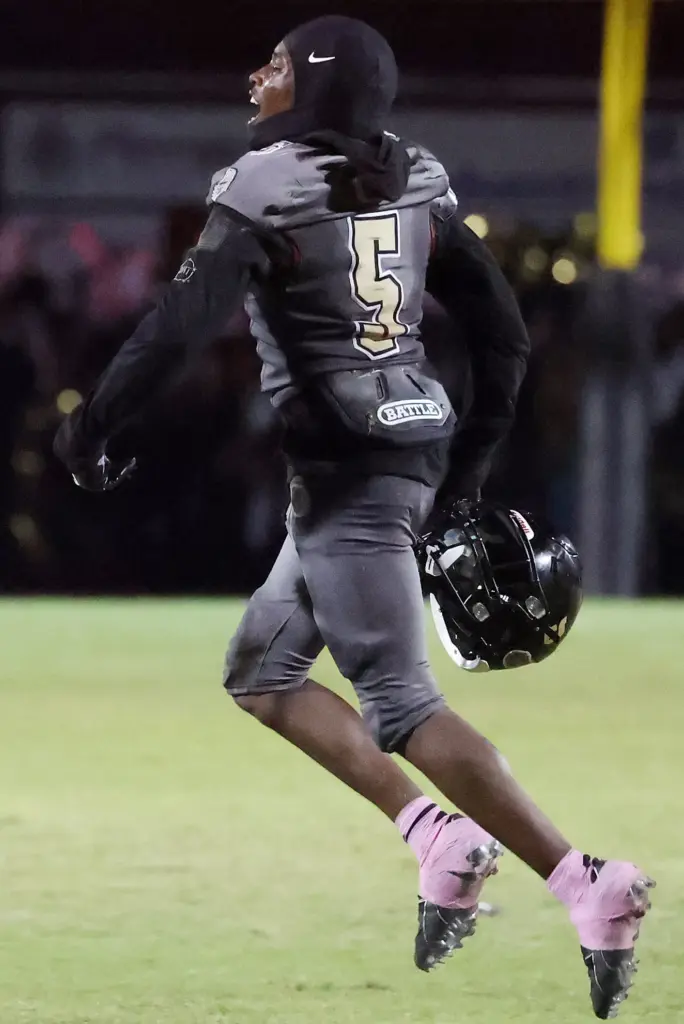 Ocoee player Trey Taylor celebrates after a play during the...