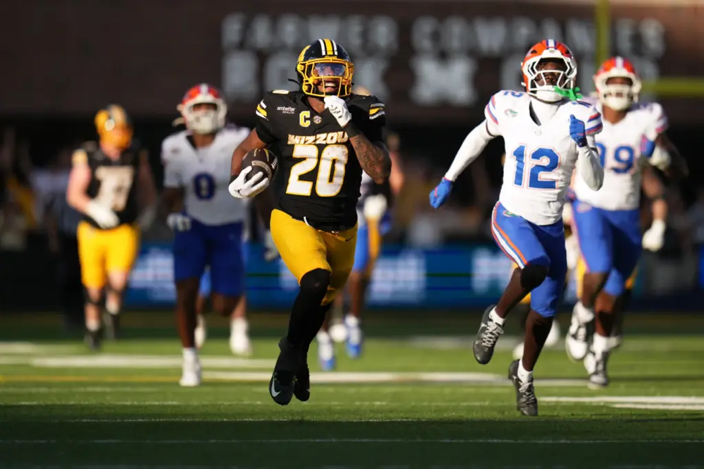 Missouri running back Jamal Roberts (20) carries the ball for...