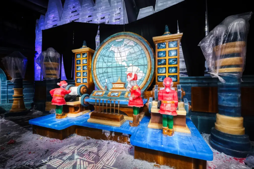 Master ice artisans from Harbin, China, at work during a...